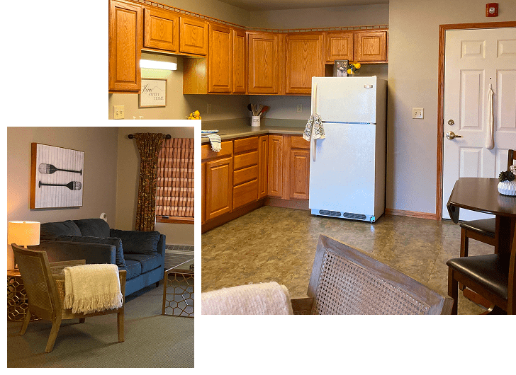 A cozy living area with a dark blue armchair and a wooden chair with a yellow blanket, next to a window with plaid curtains. The window has a wooden valance, and a piece of wall art featuring silverware hangs above the chair. The main image shows a kitchen with wooden cabinets, a white refrigerator, a gray countertop, and a small table with chairs near a door.